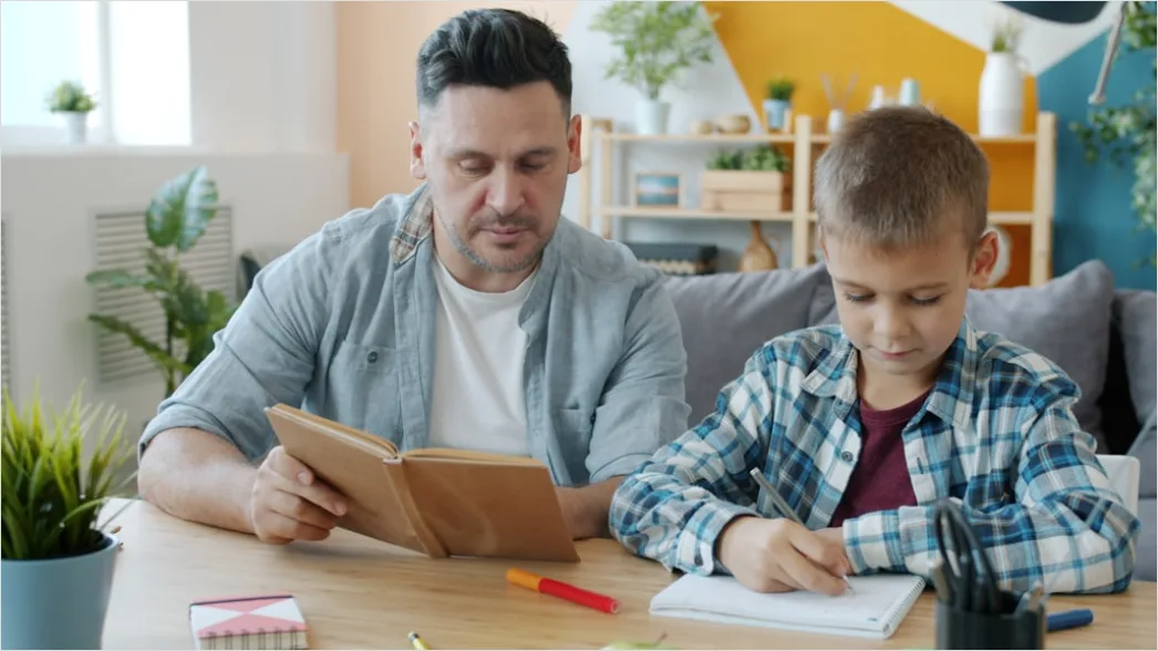 Detail Child Reading Book With Parent At Home Number 4