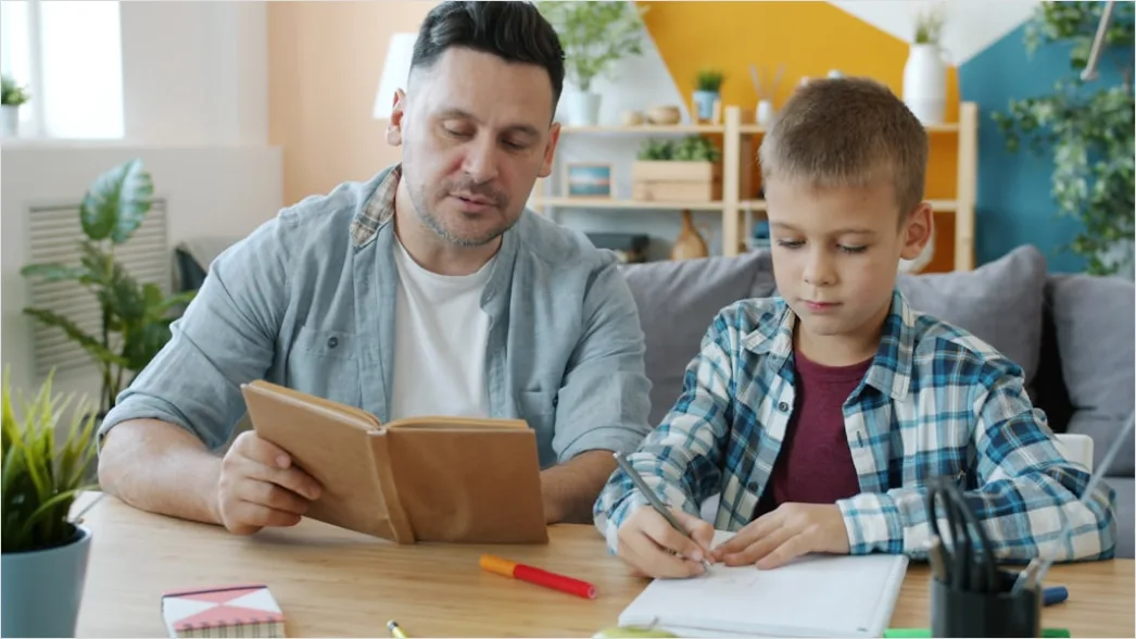 Detail Child Reading Book With Parent At Home Number 5