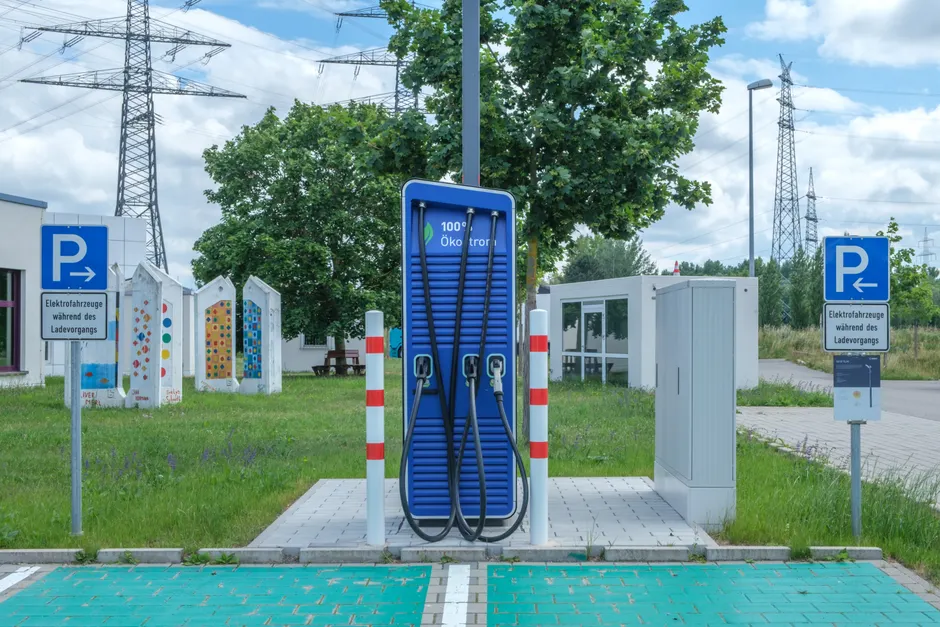 Detail Ev Charging Concept With Glowing Icons Overlay Number 4