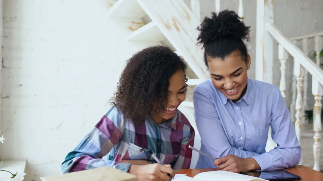 Detail High School Teacher Helping Student At Desk Number 6