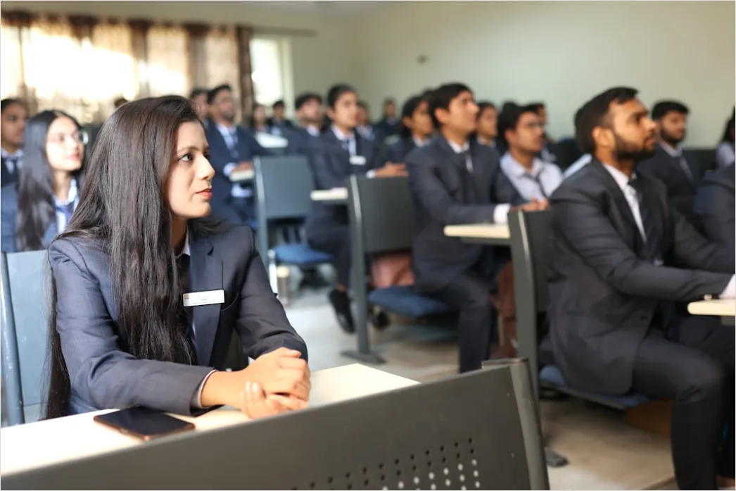 Detail Lecture Hall Students Seated Listening Attentively Number 13