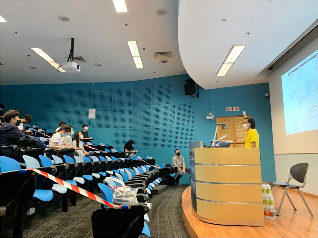 Detail Lecture Hall Students Seated Listening Attentively Number 17
