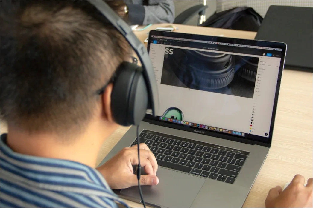 Detail Student Wearing Headphones Watching Online Lecture Number 2