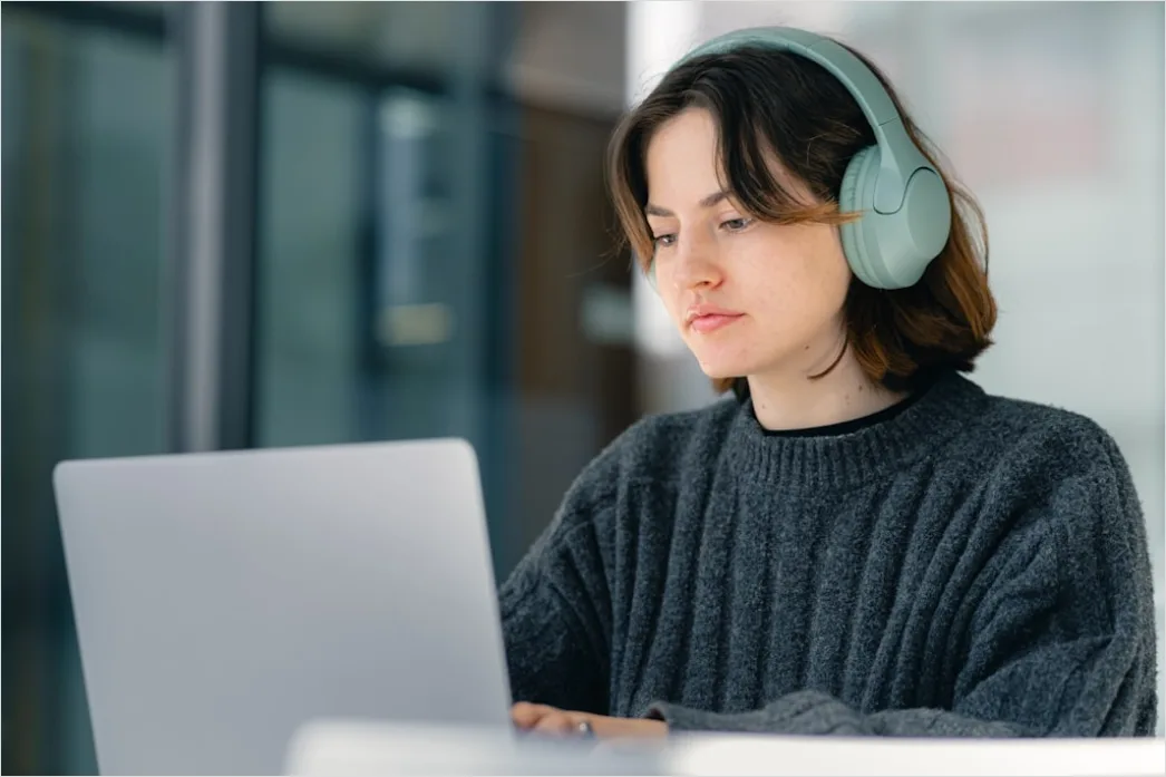 Detail Student Wearing Headphones Watching Online Lecture Number 3