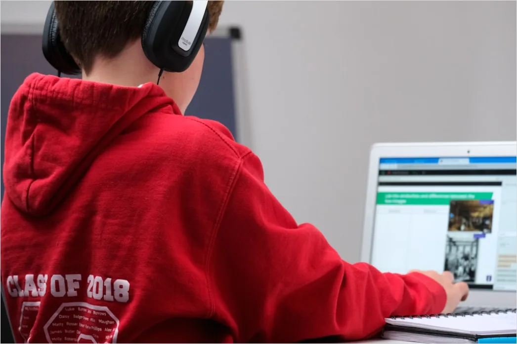Detail Student Wearing Headphones Watching Online Lecture Number 9