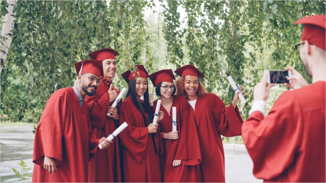 Detail Students Celebrating Graduation Outdoors Group Photo Number 5