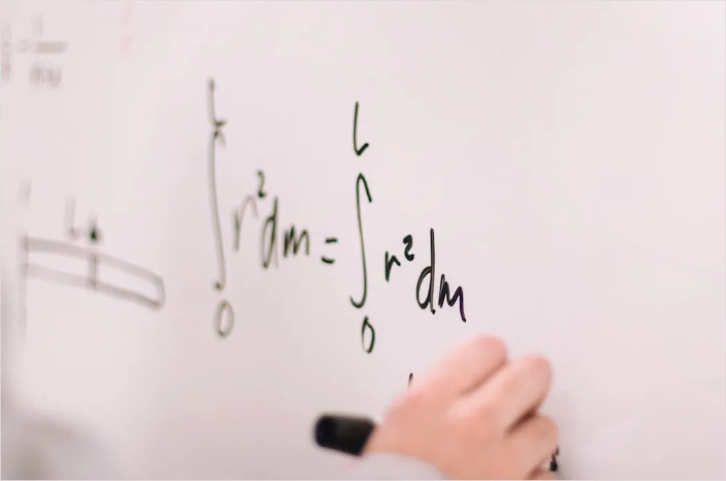Detail Teacher Explaining Math Concept On Whiteboard Number 7
