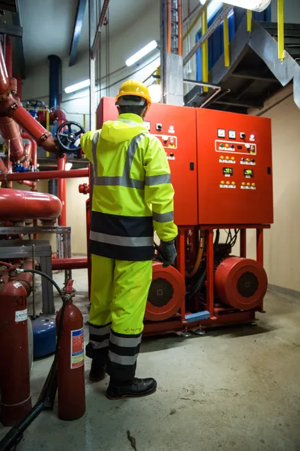 Detail Chemical Plant Maintenance Worker Inspecting Equipment Number 11