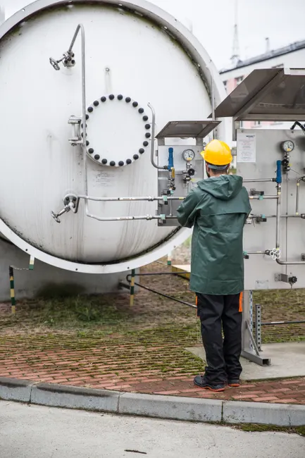 Detail Chemical Plant Maintenance Worker Inspecting Equipment Number 13