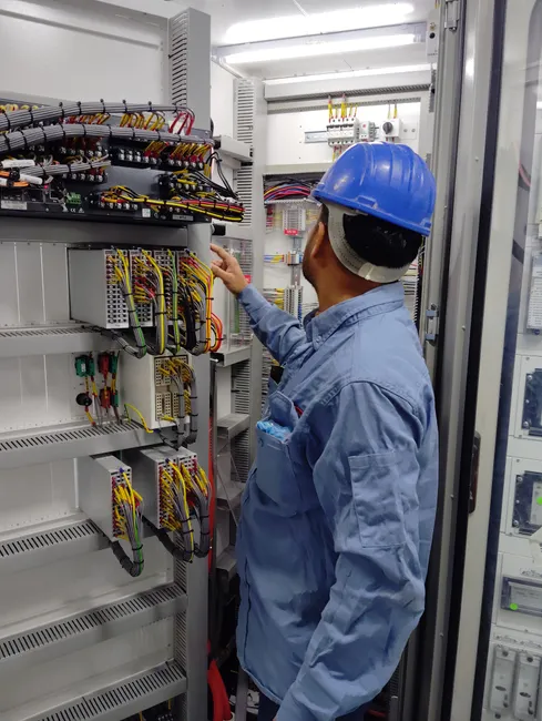 Detail Chemical Plant Maintenance Worker Inspecting Equipment Number 16