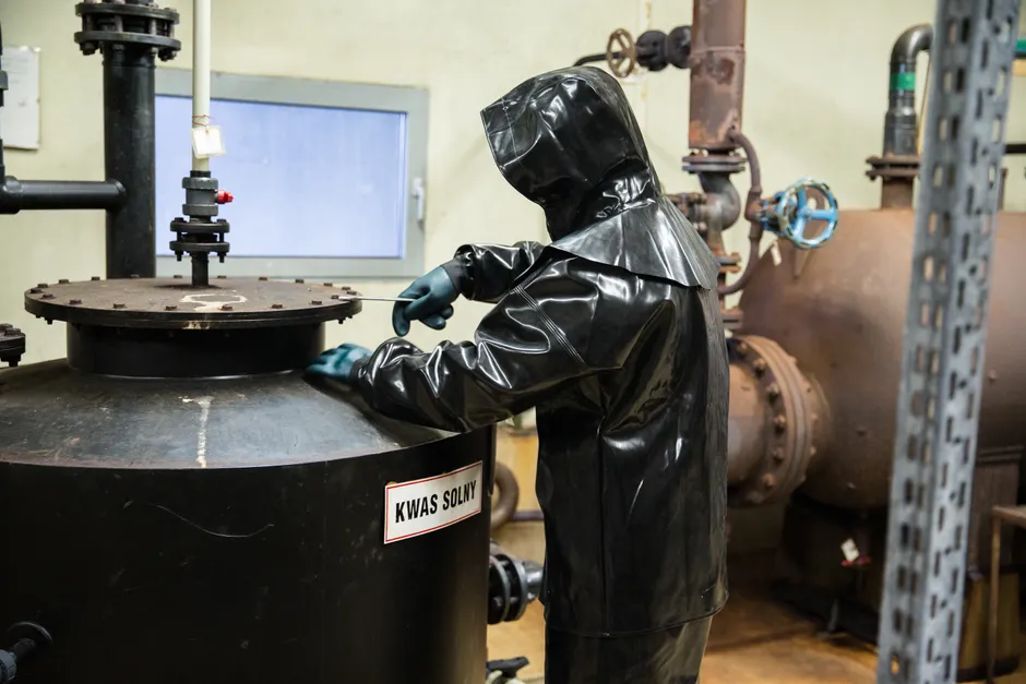 Detail Chemical Plant Maintenance Worker Inspecting Equipment Number 18