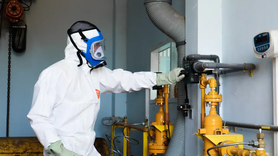 Detail Chemical Plant Maintenance Worker Inspecting Equipment Number 20