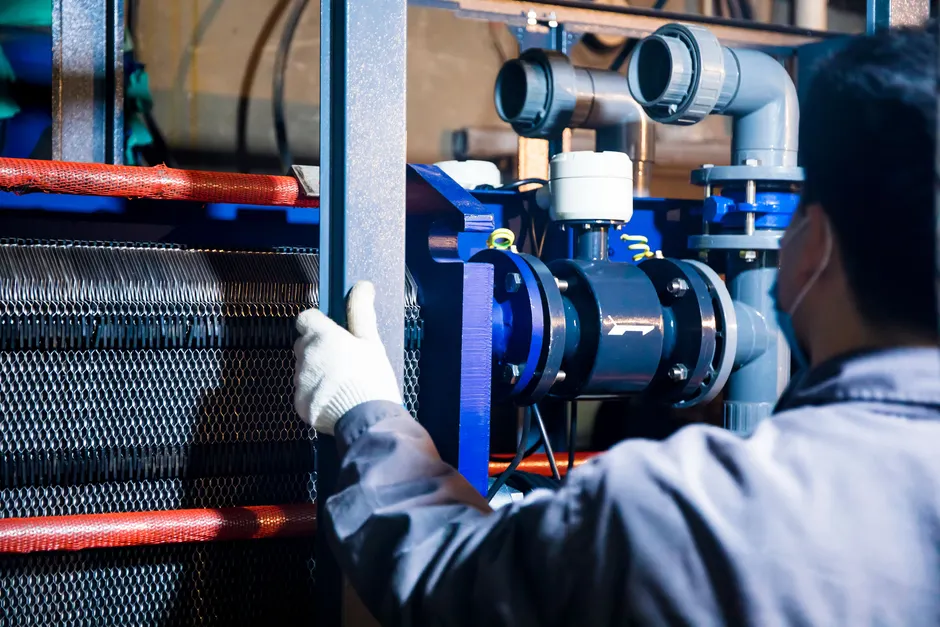 Detail Chemical Plant Maintenance Worker Inspecting Equipment Number 4