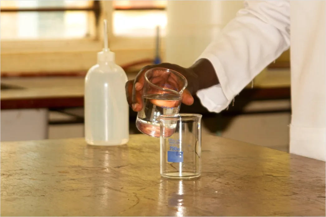 Detail Chemist Measuring Liquid With Graduated Cylinder Number 11