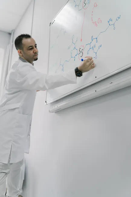 Detail Chemistry Equations On Glass Board In Lab Number 2