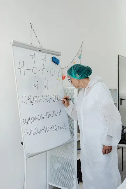 Detail Chemistry Equations On Glass Board In Lab Number 11