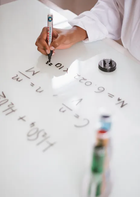 Detail Chemistry Equations On Glass Board In Lab Number 13