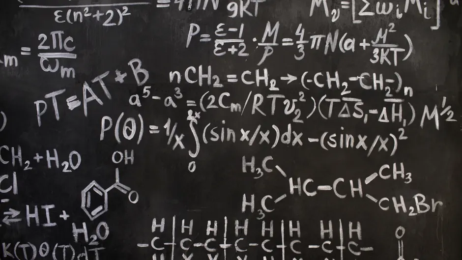 Detail Chemistry Equations On Glass Board In Lab Number 17