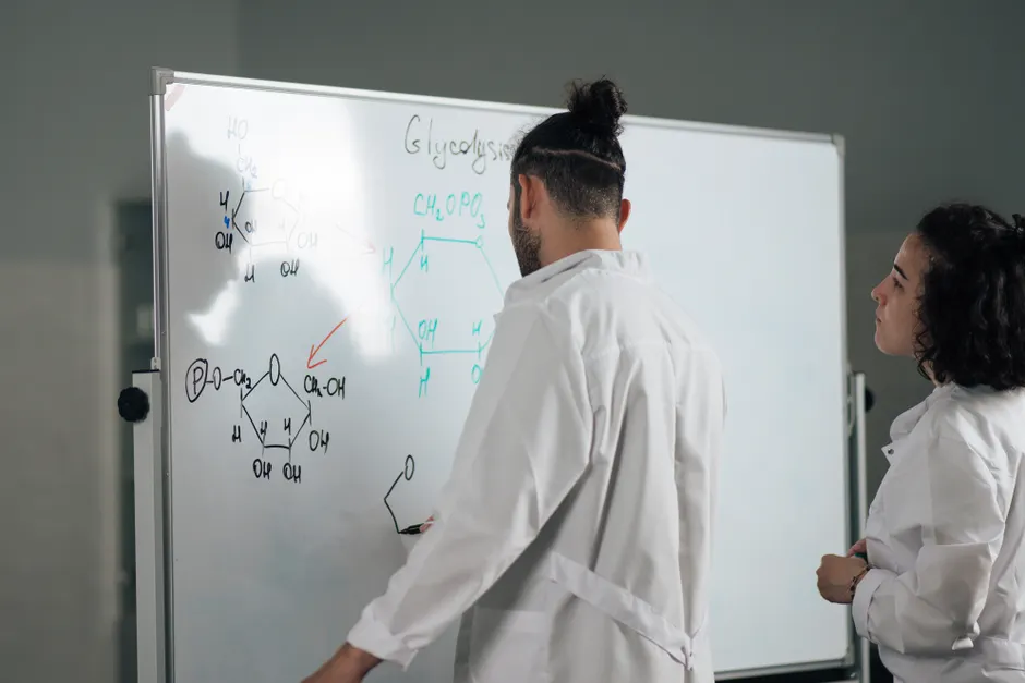 Detail Chemistry Equations On Glass Board In Lab Number 10