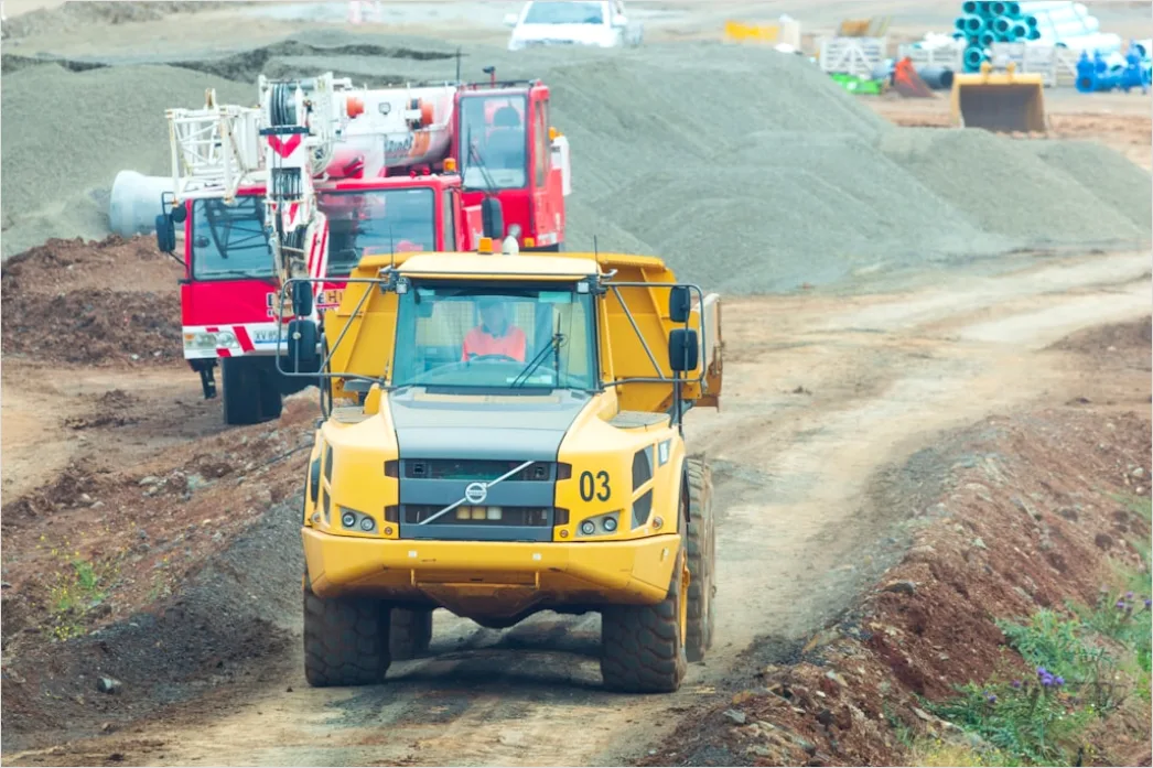 Detail Concrete Mixing Truck Pouring At Construction Site Number 9