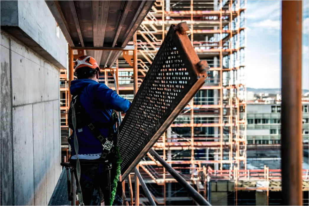 Detail Construction Worker Wearing Safety Harness At Height Number 2