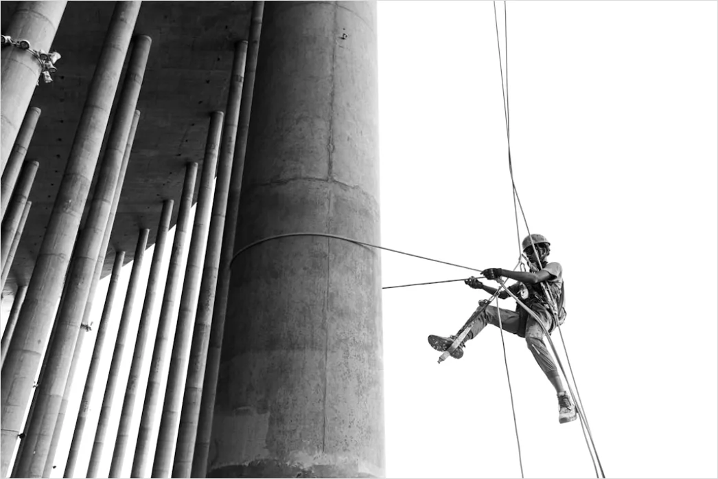 Detail Construction Worker Wearing Safety Harness At Height Number 3