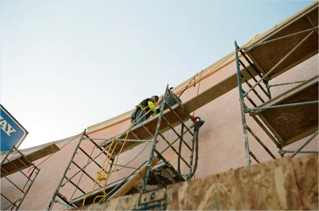 Detail Construction Worker Wearing Safety Harness At Height Number 4