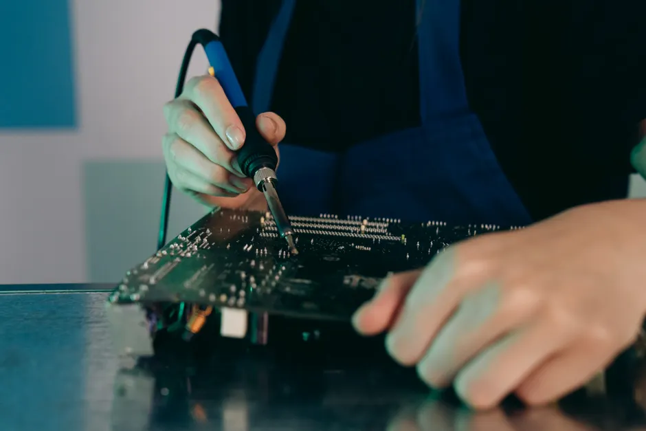 Detail Electronics Assembly Line Workers Soldering Circuit Boards Number 14