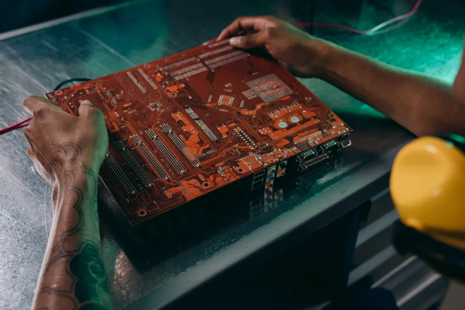 Detail Electronics Assembly Line Workers Soldering Circuit Boards Number 19