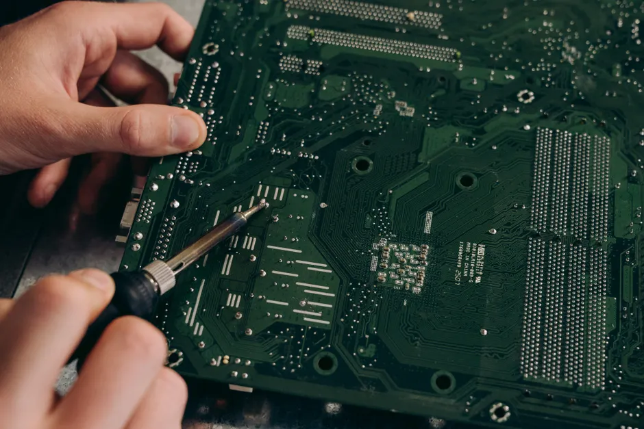 Detail Electronics Assembly Line Workers Soldering Circuit Boards Number 20