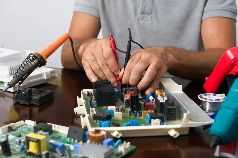 Detail Electronics Assembly Line Workers Soldering Circuit Boards Number 3
