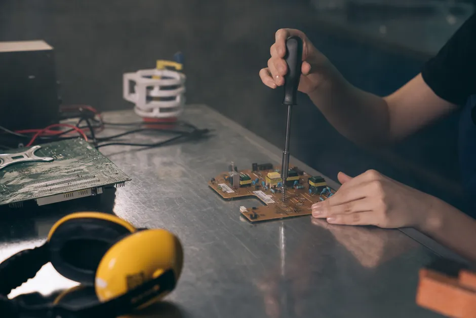 Detail Electronics Assembly Line Workers Soldering Circuit Boards Number 5