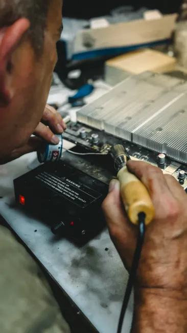 Detail Electronics Assembly Line Workers Soldering Circuit Boards Number 10