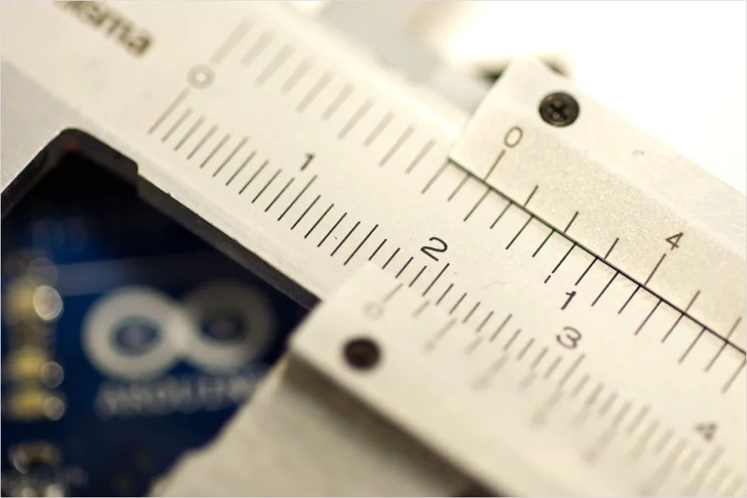 Engineer Measuring Component With Caliper Close Up 88a5