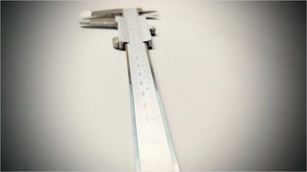 Detail Engineer Measuring Component With Caliper Close Up Number 16