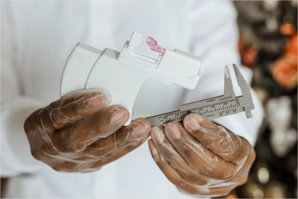 Detail Engineer Measuring Component With Caliper Close Up Number 9