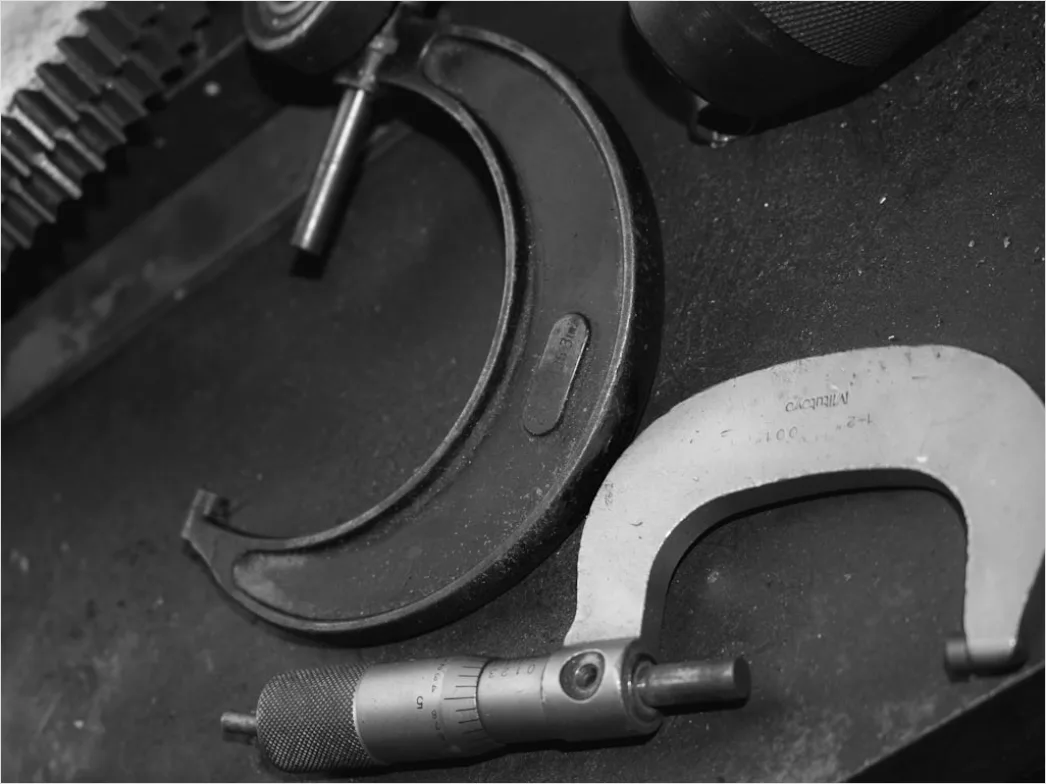 Detail Engineer Measuring Component With Caliper Close Up Number 10