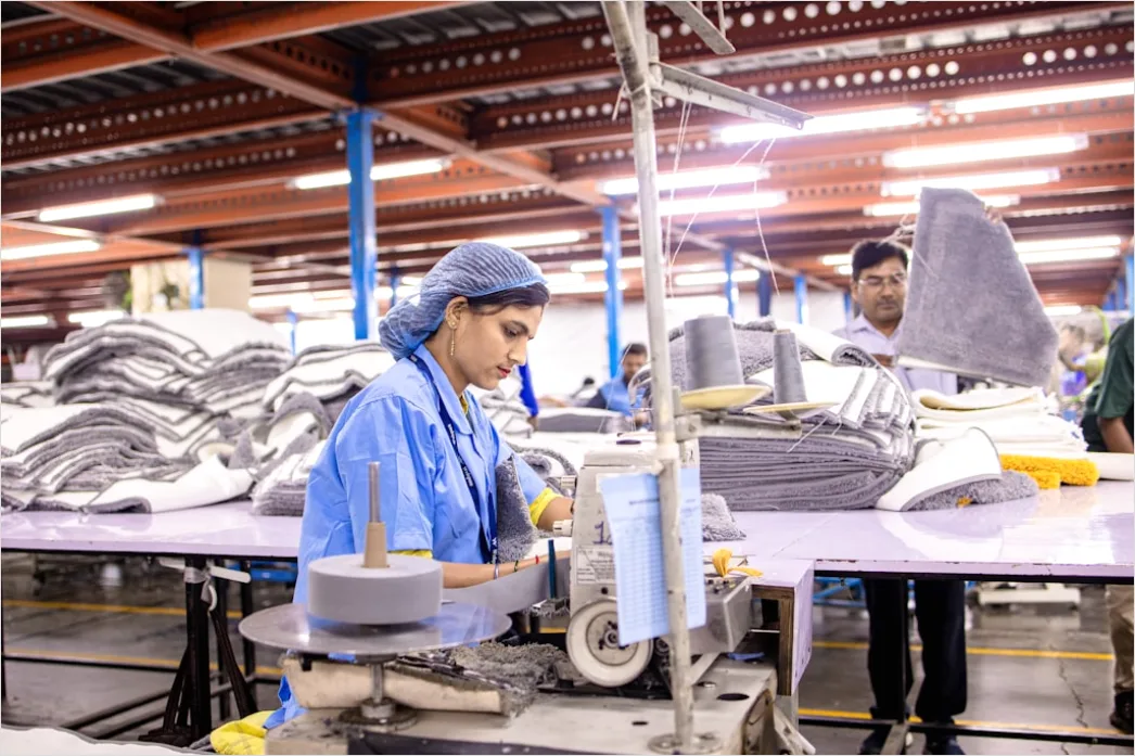 Detail Factory Floor Workers In Safety Gear Working Number 11