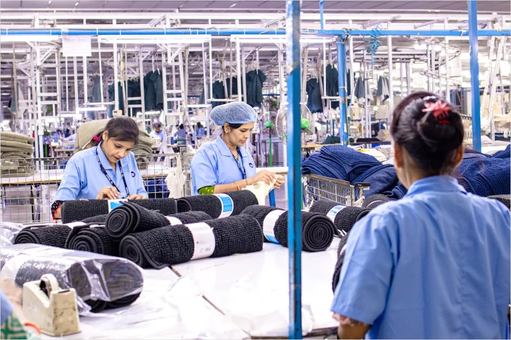 Detail Factory Floor Workers In Safety Gear Working Number 12