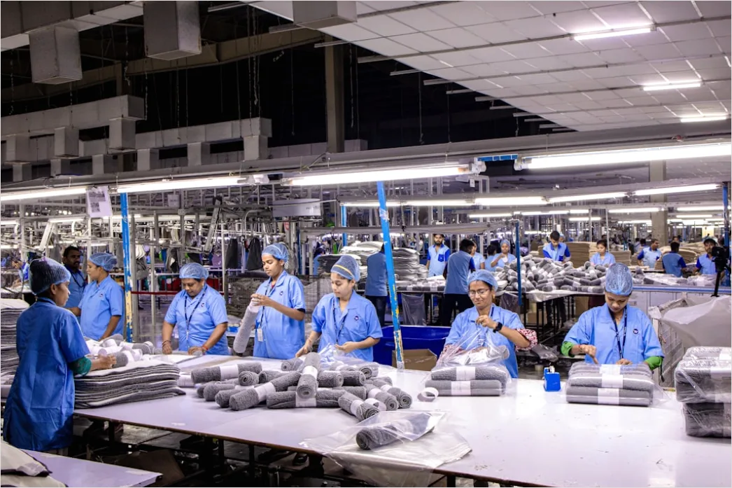 Detail Factory Floor Workers In Safety Gear Working Number 14