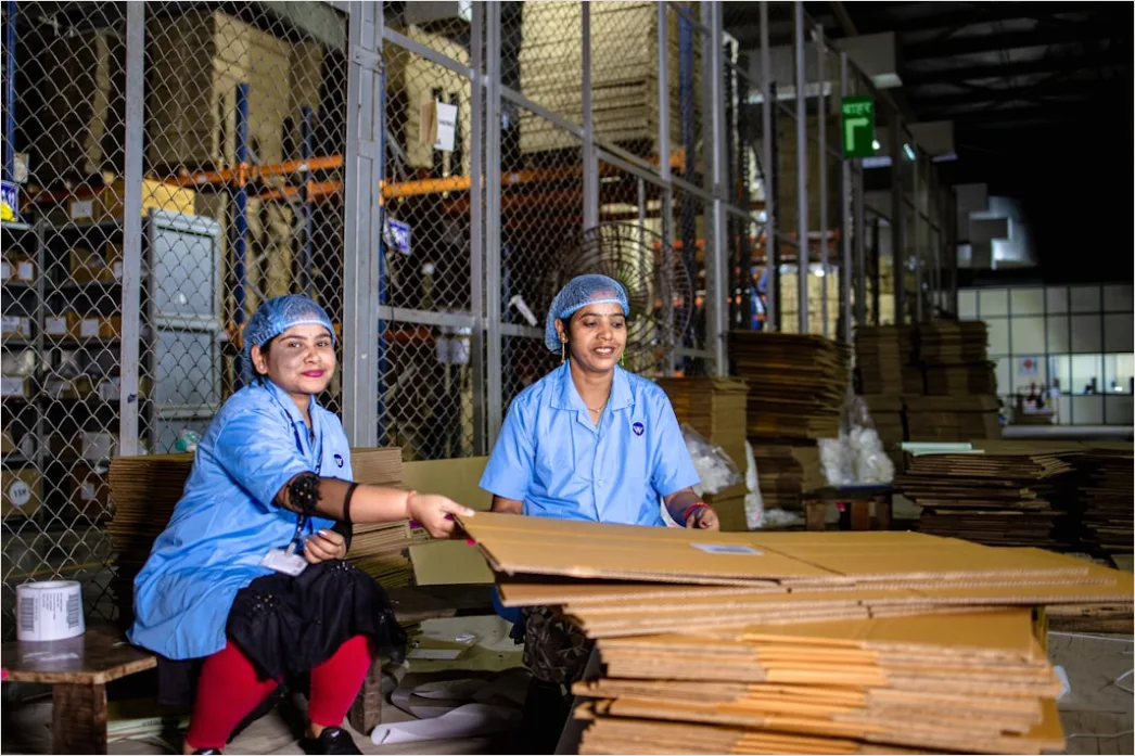Detail Factory Floor Workers In Safety Gear Working Number 16