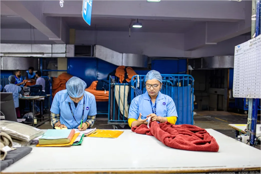 Detail Factory Floor Workers In Safety Gear Working Number 18