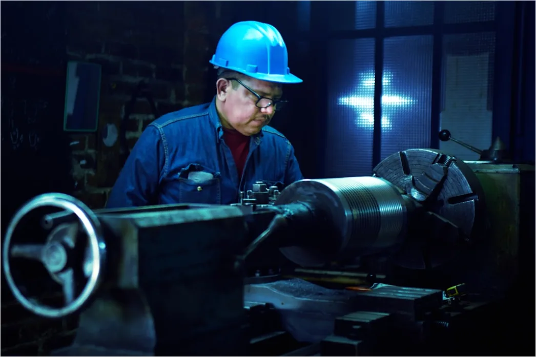 Factory Shift Workers Operating Machinery At Night 9360