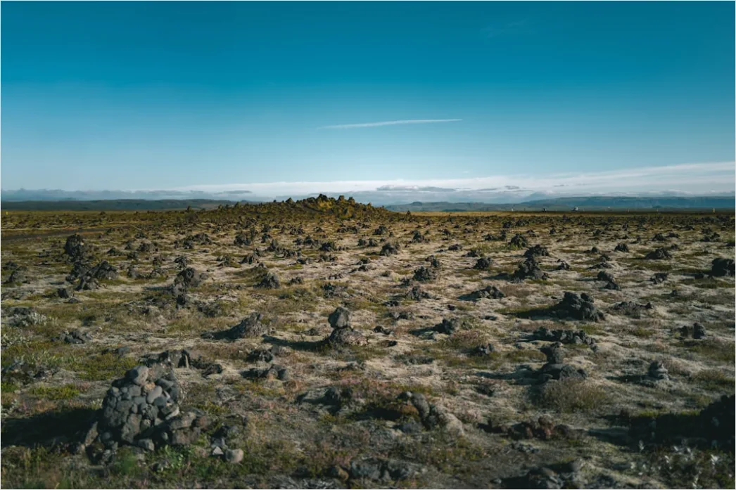 Detail Geologist Examining Rock Formations In Field Number 3