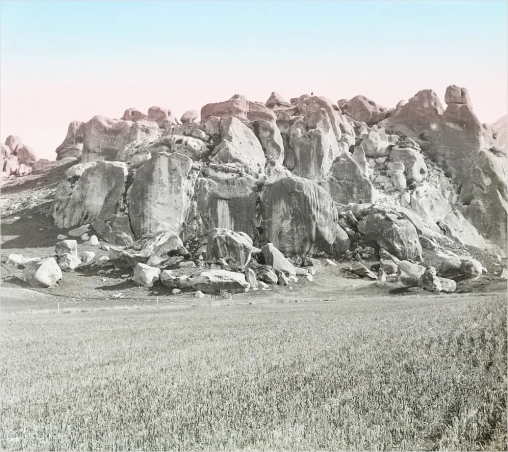 Detail Geologist Examining Rock Formations In Field Number 6