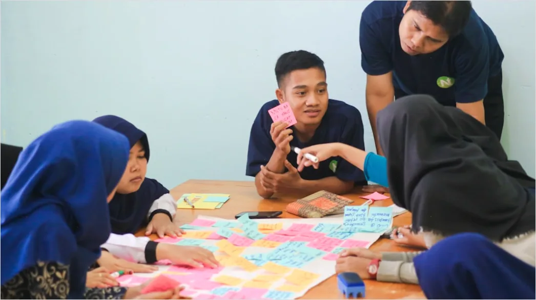 Detail Language Learning Class Adults Practicing Conversation Number 4