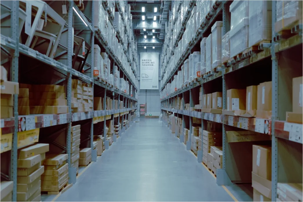 Large Warehouse Interior With Organized Shelving Aisles 8442