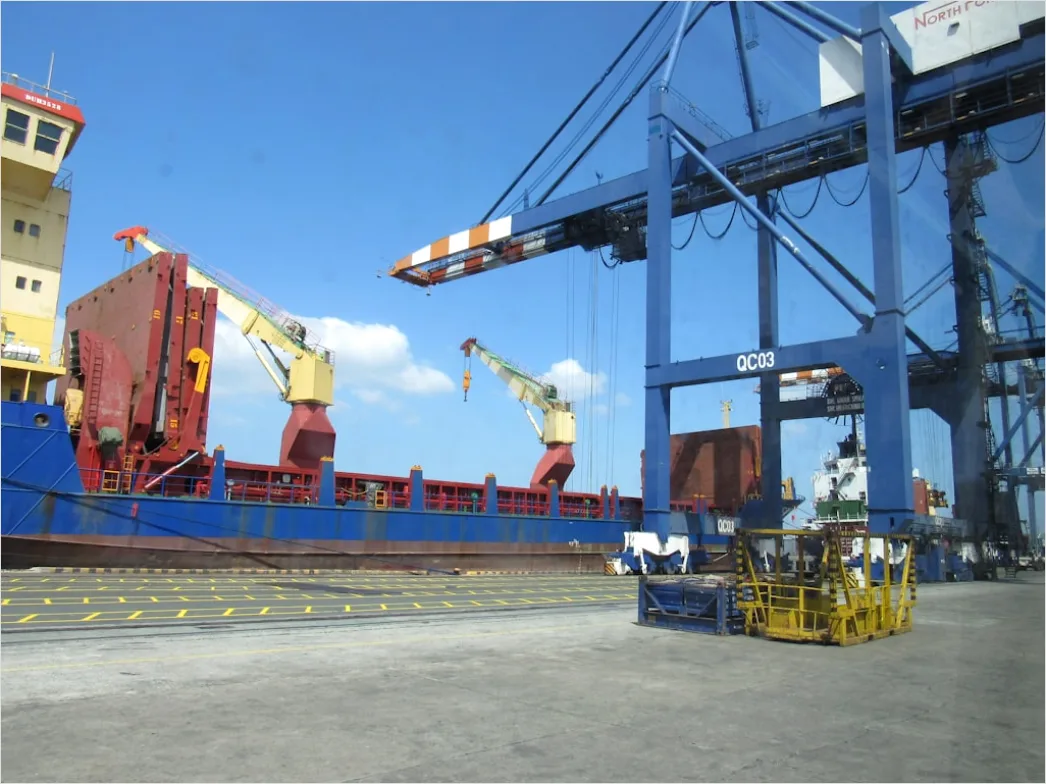 Detail Logistics Worker Loading Truck At Dock Number 11