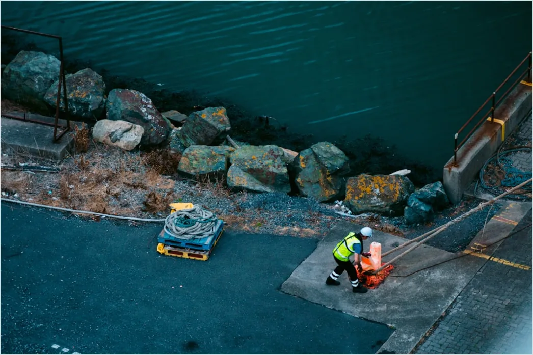 Detail Logistics Worker Loading Truck At Dock Number 12