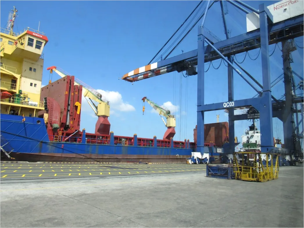 Detail Logistics Worker Loading Truck At Dock Number 15